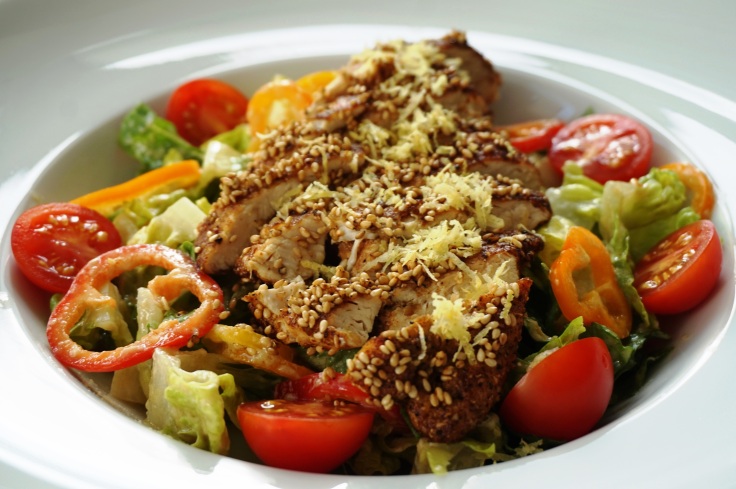 Sesame chicken with roma salad